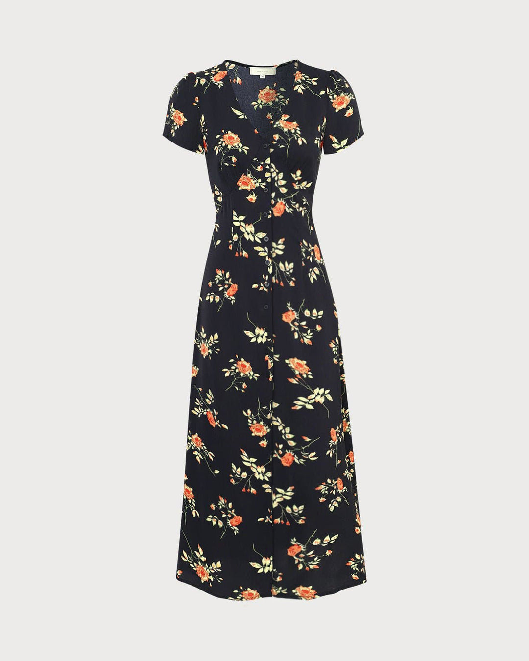 El vestido largo floral negro con escote en V y mangas cortas.