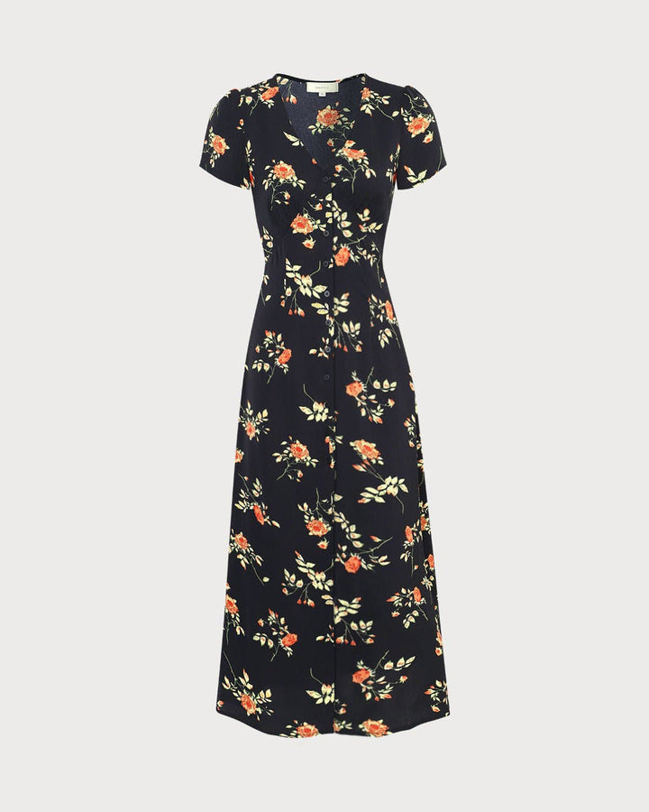 El vestido largo floral negro con escote en V y mangas cortas.