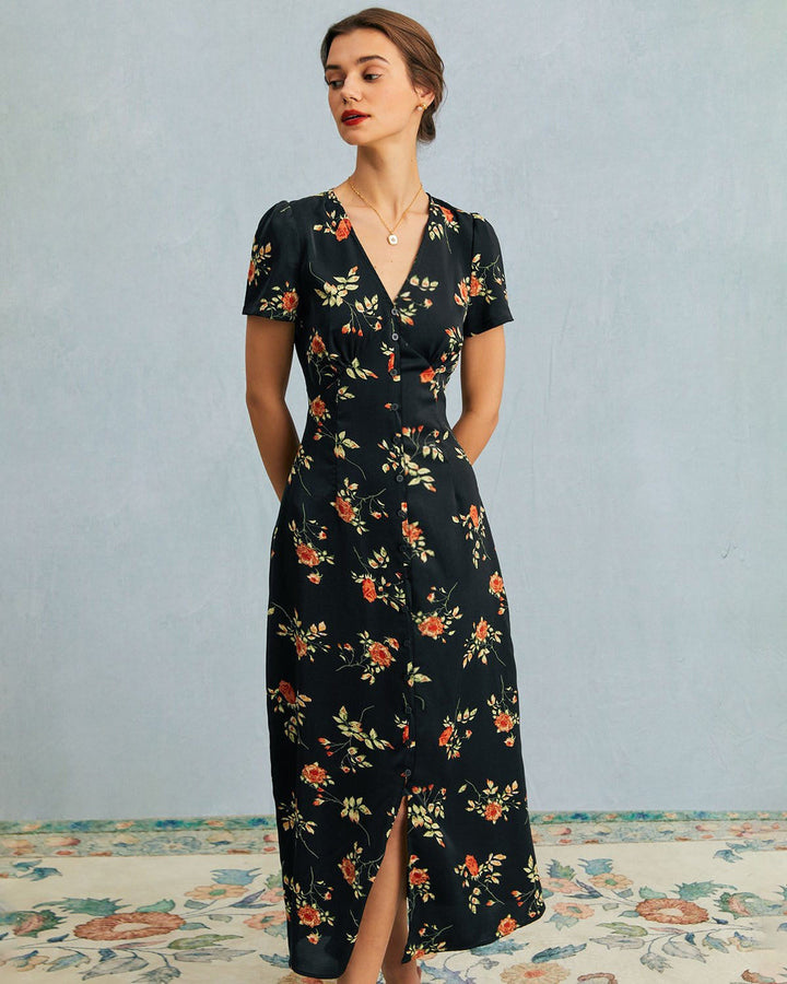 El vestido largo floral negro con escote en V y mangas cortas.