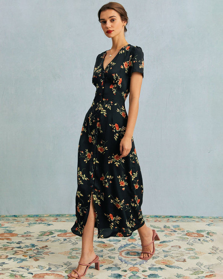 El vestido largo floral negro con escote en V y mangas cortas.